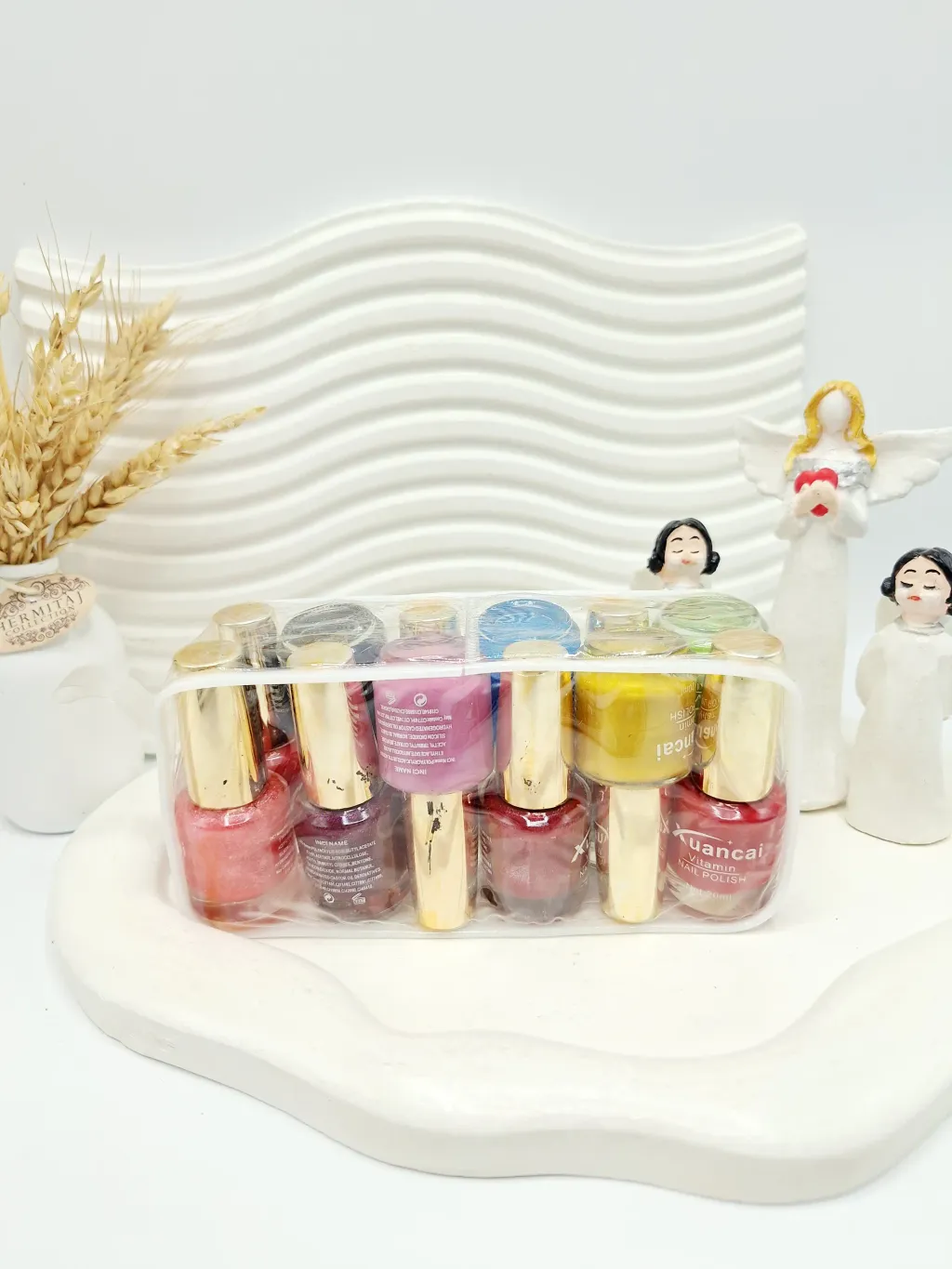 پک 12 تایی لاک ناخن Xuancai همراه کیف 1 پک 12 تایی لاک ناخن Xuancai همراه کیف