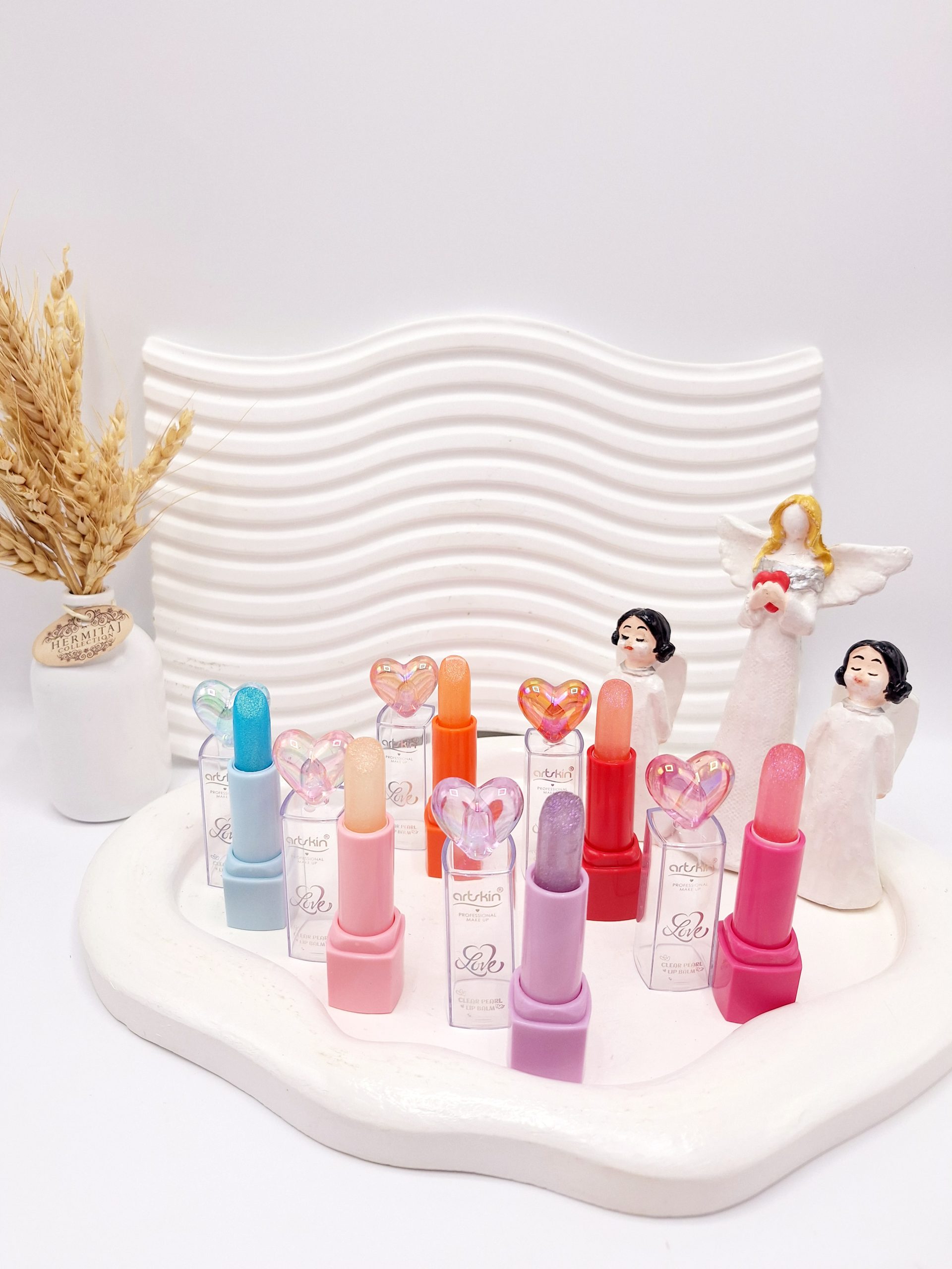 بالم لب شاین دار پوکه قلبی شیشه ای برند آرت اسکین کد 971127 1 بالم لب شاین دار پوکه قلبی شیشه ای برند آرت اسکین کد 971127